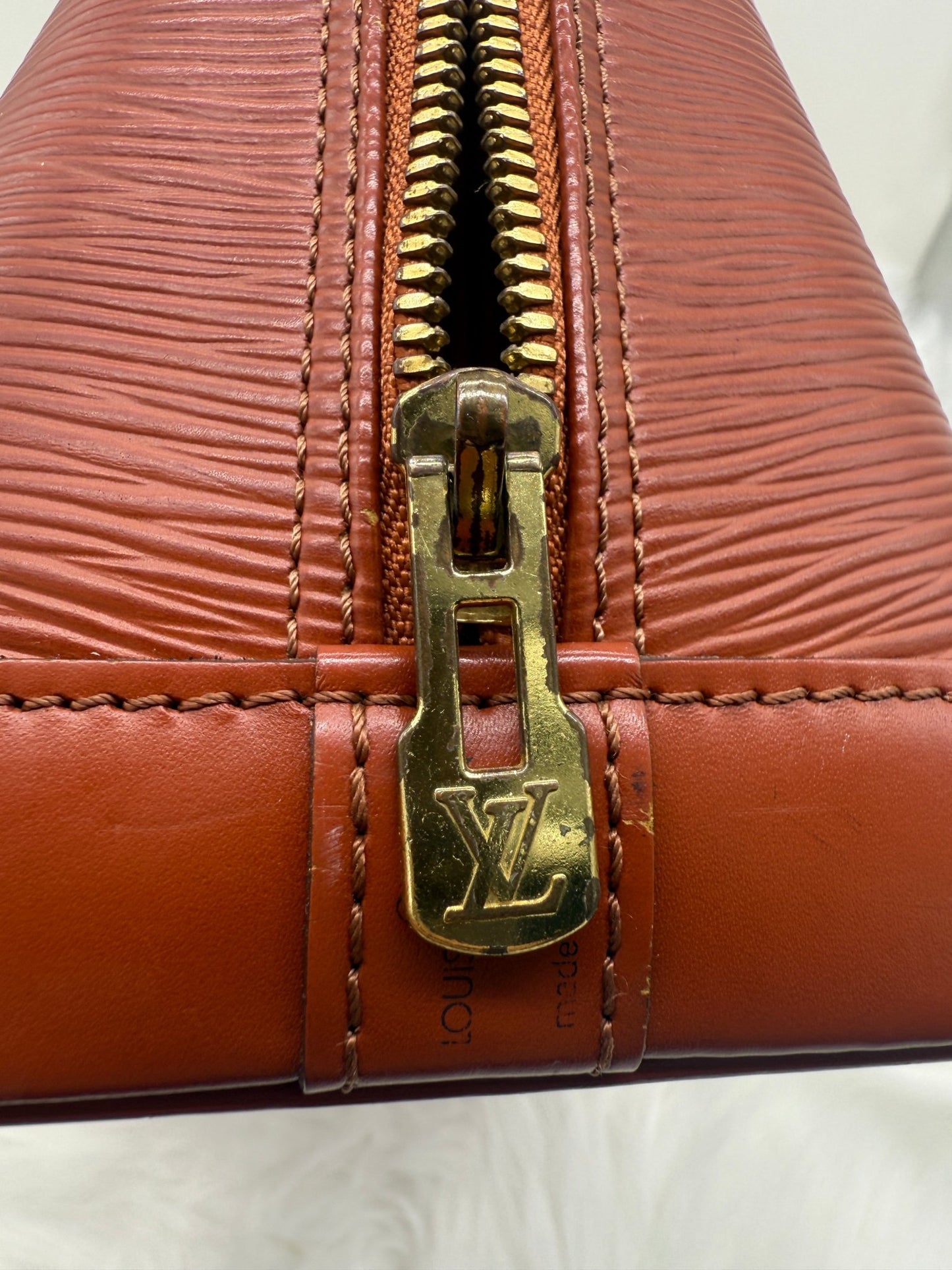 Louis Vuitton Alma PM Epi Leather in Brown - Styles via Sina