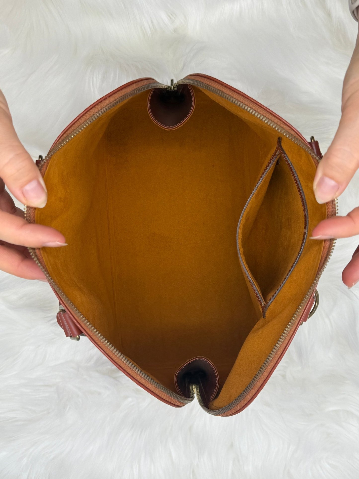 Louis Vuitton Alma PM Epi Leather in Brown - Styles via Sina