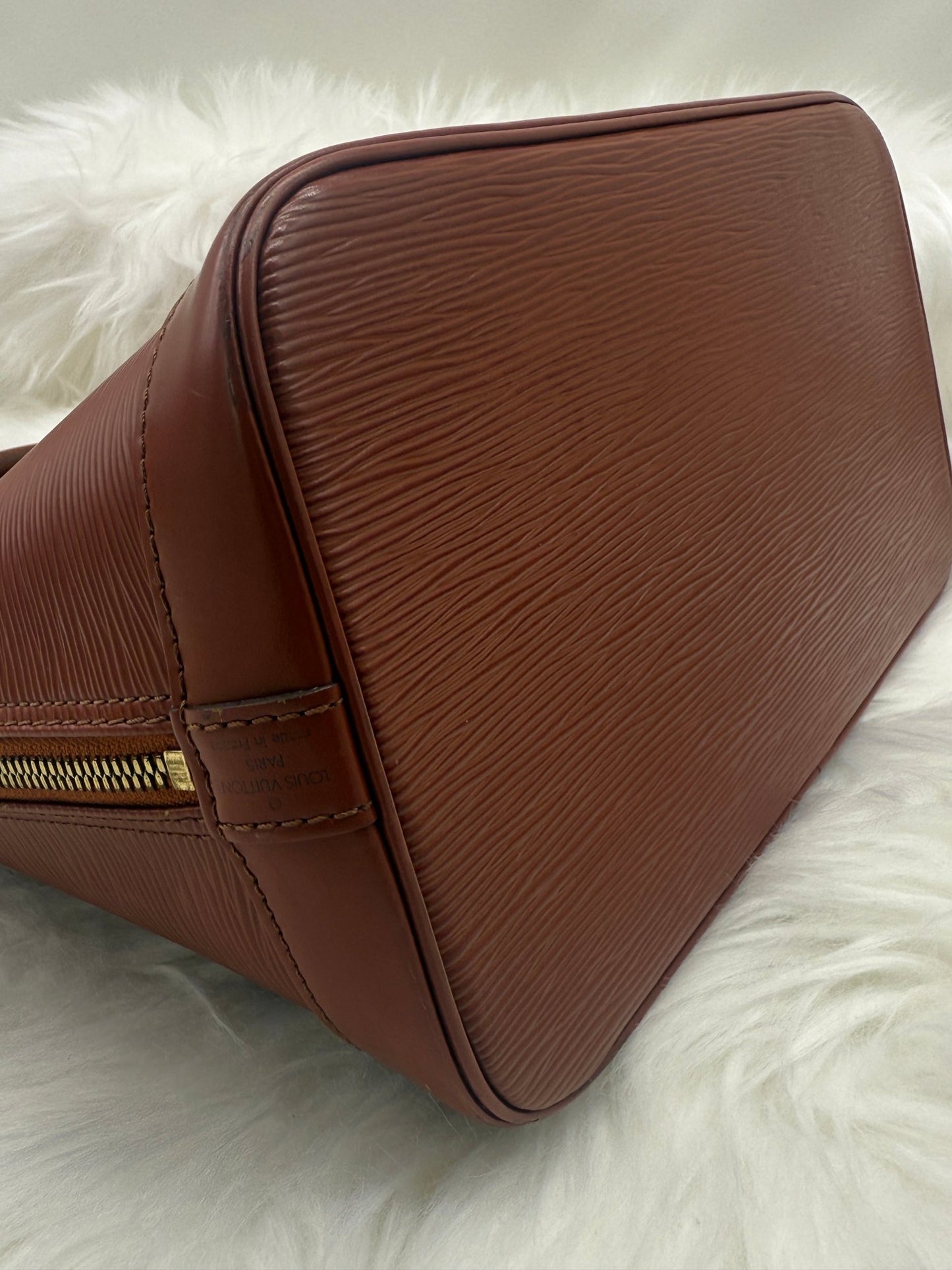 Louis Vuitton Alma PM Epi Leather in Brown - Styles via Sina