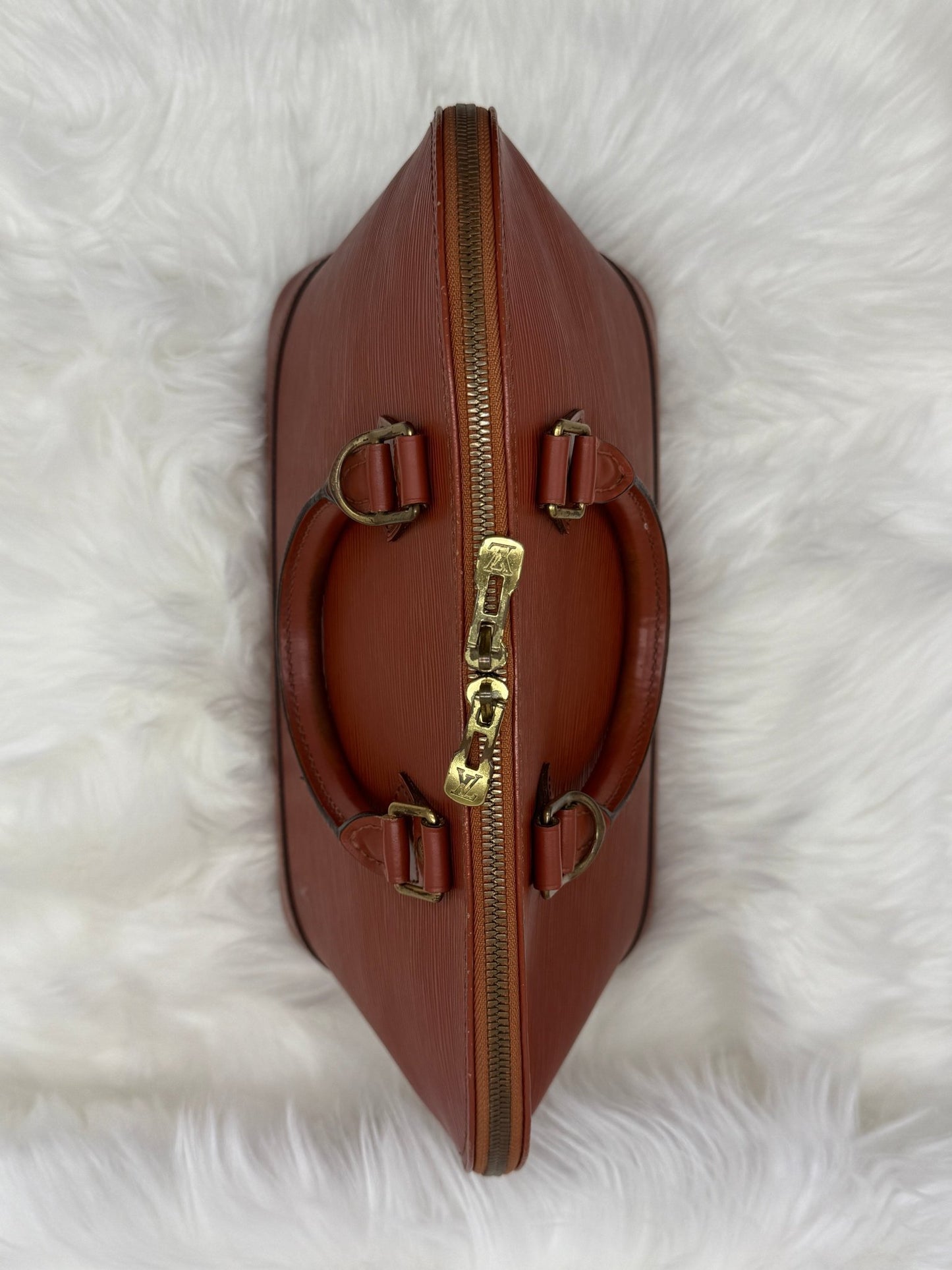 Louis Vuitton Alma PM Epi Leather in Brown - Styles via Sina