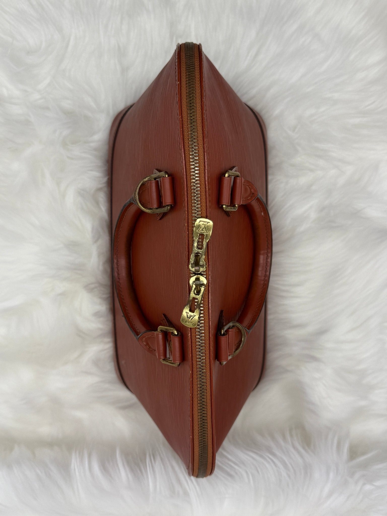 Louis Vuitton Alma PM Epi Leather in Brown - Styles via Sina