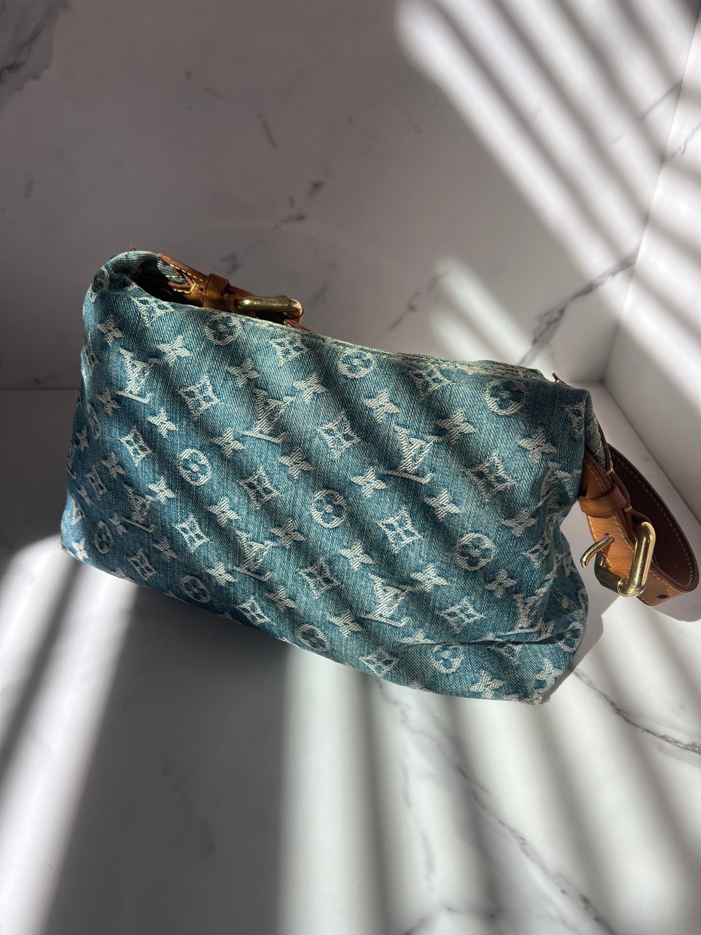 Louis Vuitton Baggy PM Monogram Denim in Blue - Styles via Sina
