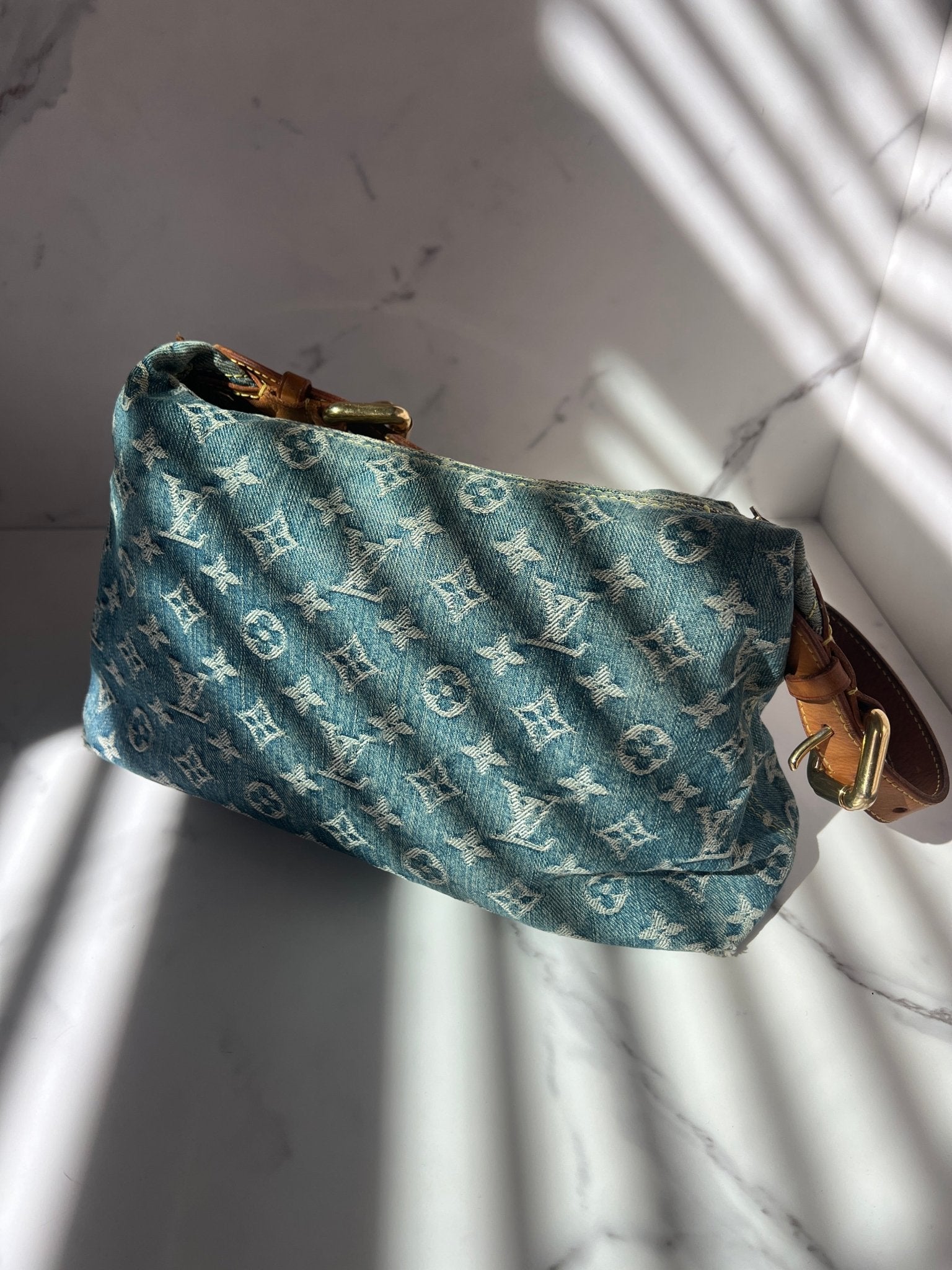 Louis Vuitton Baggy PM Monogram Denim in Blue - Styles via Sina