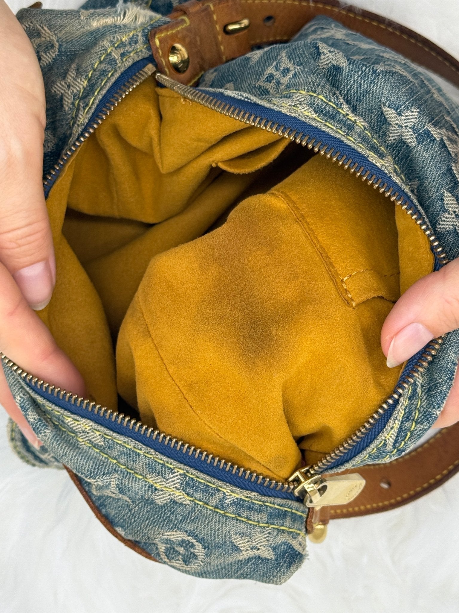 Louis Vuitton Baggy PM Monogram Denim in Blue - Styles via Sina